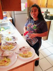 Aracely helping in the Dorie's Promise kitchen.